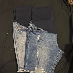 Two pairs of maternity shorts. One size small (4-6) one size Medium (8-10).